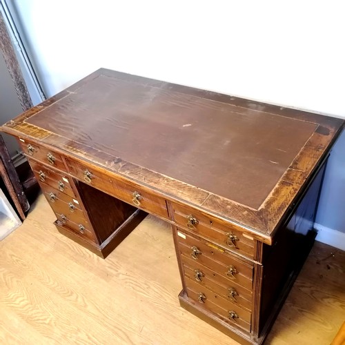 543 - Antique oak twin pedestal desk with rexine top -123cm x 62.5cm x 71cm (in 3 parts) - split to sides,... 