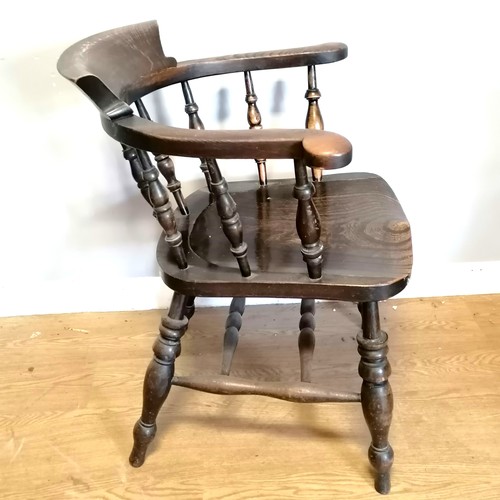 548 - Antique elm captain's chair - in good condition