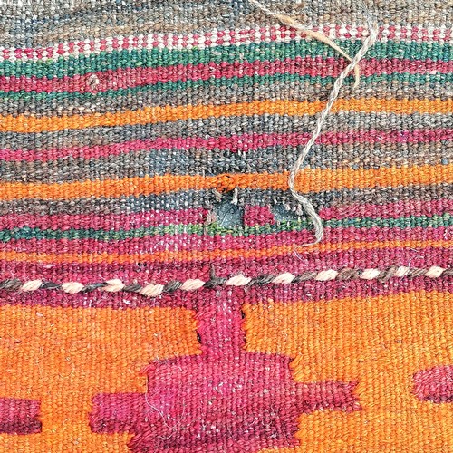 566 - Kilim carpet - orange / blue / green - approx 375cm x 262cm & has some wear holes