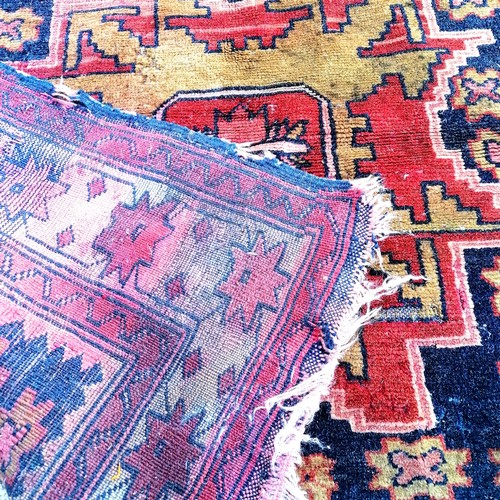 568 - Persian small square rug - approx 100cm square & has some wear