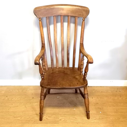 577 - Antique elm and beech slat back farmhouse high back chair. 115cm high x 54cm wide x 44cm deep.In goo... 