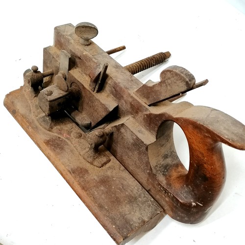 599 - Quantity of antique carpenter's planes and a clamp