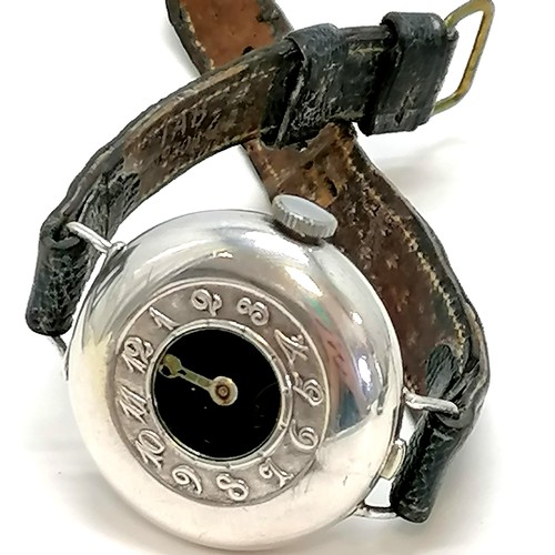 324A - 1st world war silver cased trench wristwatch with black enamel dial and   half hunter style cover wi... 