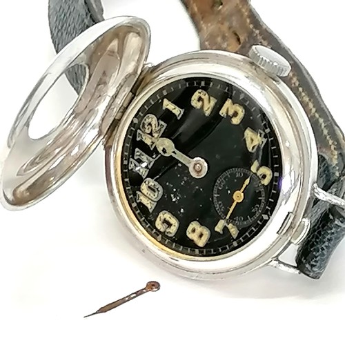 324A - 1st world war silver cased trench wristwatch with black enamel dial and   half hunter style cover wi... 