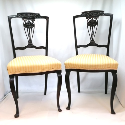 583B - Edwardian pair of parlour chairs with yellow upholstery. some old repairs including 1 leg. 88cm high