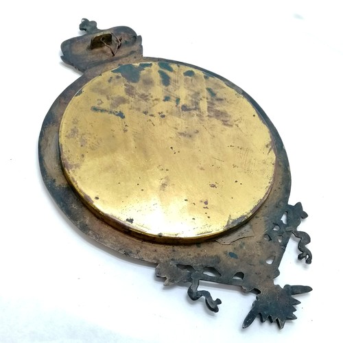 11 - Antique bevelled edge mirror in a brass mount with crown / heraldic decoration - 30cm x 19cm t/w nov... 