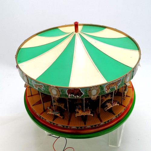 50 - Corgi c.1960's motorised funfair merry-go-round 28cm diameter x 20cm high ~ losses to jewelled decor... 