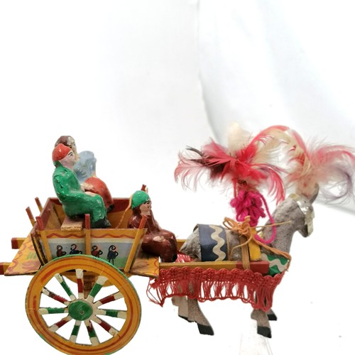 51 - Collection of foreign dolls including an Indian wooden horse and carriage with clay figures and hors... 