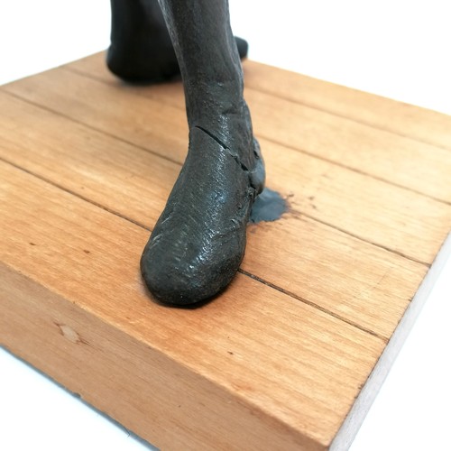 52 - Reproduction of a Degas ballerina figure on a wooden base 34cm high old repair to 1 foot T/W a book ... 