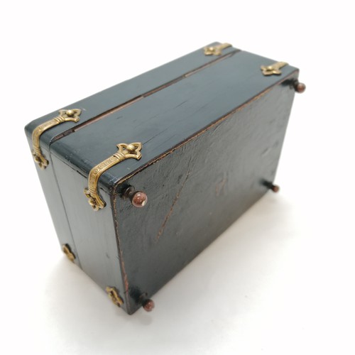 481 - Antique continental ebonised metal mounted jewellery box with a velvet interior on 4 brass feet ~ 14... 