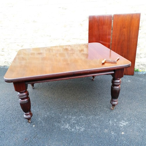 729 - Antique mahogany extending dining table with 2 spare leaves and winding handle 120cm wide x 145cm cl... 