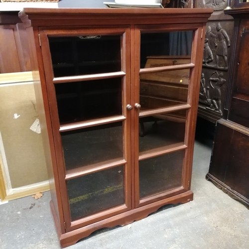 739 - Hardwood glazed two door cabinet 110cm wide x 146cm high x 43cm deep