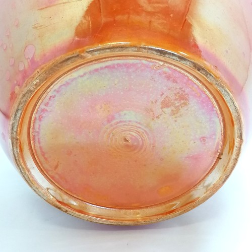 13 - High fired orange glazed art pottery vase - 25cm high with firing fault to rim with slight loss to i... 