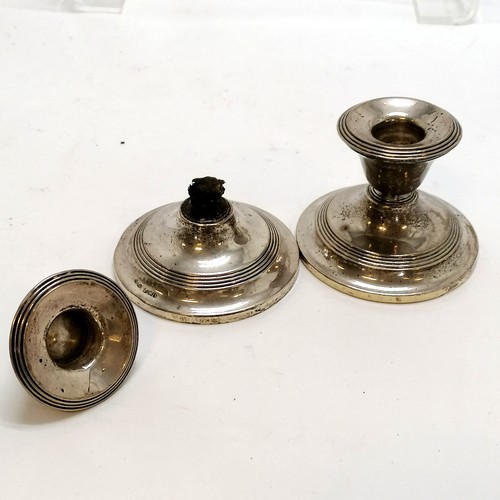 16 - Pair of silver squat candlesticks 1 A/F T/W a pair of brass candlesticks, cutlery, glass bowl etc.