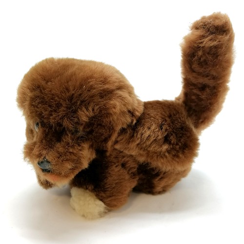 52 - Carl Original walking bear 22cm long with key T/W a musical puppy that you wind up using the tail, b... 