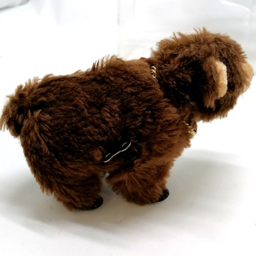 52 - Carl Original walking bear 22cm long with key T/W a musical puppy that you wind up using the tail, b... 