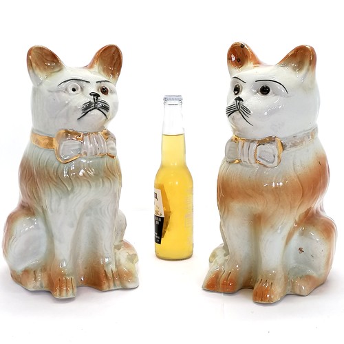 113 - Antique life-size pair of Staffordshire pottery cat figures - 33cm high ~ 1 eye missing otherwise in... 