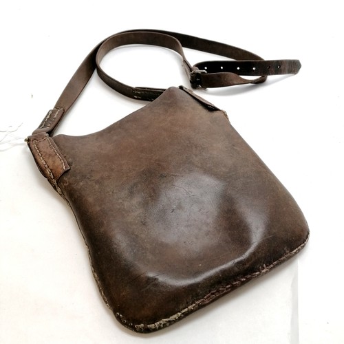 147 - Antique leather money satchel 22cm x 25cm plus strap, no rips or splits.