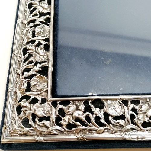 208 - Large silver fronted picture frame with pierced flower decoration & easel stand back - 32cm x 25cm ~... 