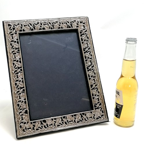 208 - Large silver fronted picture frame with pierced flower decoration & easel stand back - 32cm x 25cm ~... 