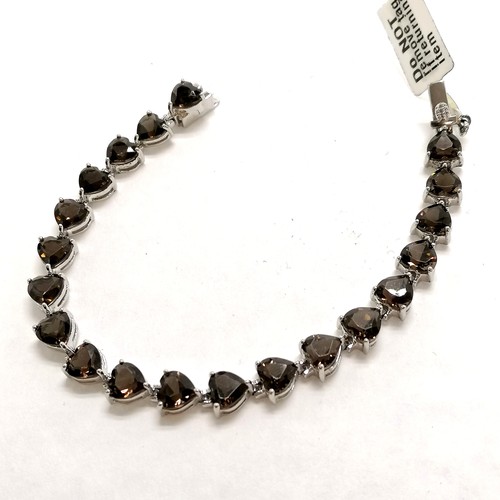 306 - Silver smoky quartz heart shaped stones bracelet in unworn condition (19cm & total weight 17.8g)