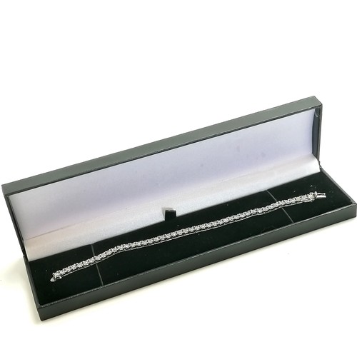 351 - 18ct hallmarked white gold diamond set tennis bracelet - 18cm long & 14g total weight ~ 45 diamonds ... 