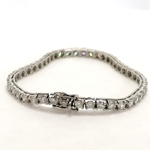 351 - 18ct hallmarked white gold diamond set tennis bracelet - 18cm long & 14g total weight ~ 45 diamonds ... 