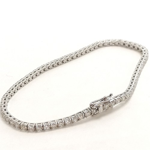 355 - 18ct marked white gold diamond set tennis bracelet - 17.5cm & 8g total weight ~ stones approx 2mm di... 