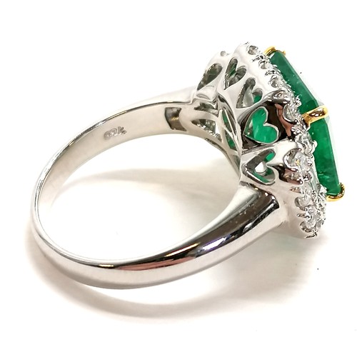 358 - 18ct white gold large emerald & diamond (brilliant & baguette) square cluster ring - size N & 6.9g t... 