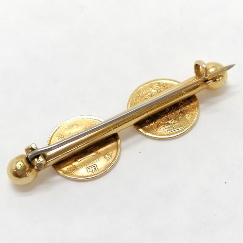 207 - Unmarked gold (touch tests as 22ct) brooch mounted with 2 x Japan 1 yen gold coins ~ total weight 6.... 