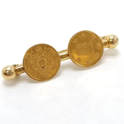 207 - Unmarked gold (touch tests as 22ct) brooch mounted with 2 x Japan 1 yen gold coins ~ total weight 6.... 