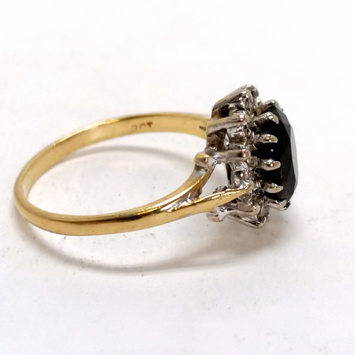 194 - 18ct marked gold garnet & diamond cluster ring - size N & 3.8g total weight