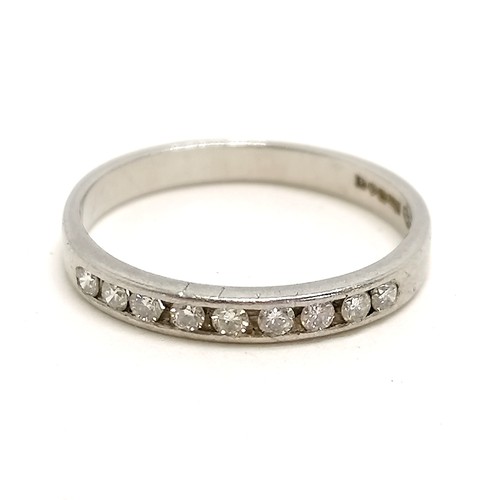 274 - Platinum & channel set diamond half eternity ring - size J½ & 2.5g total weight