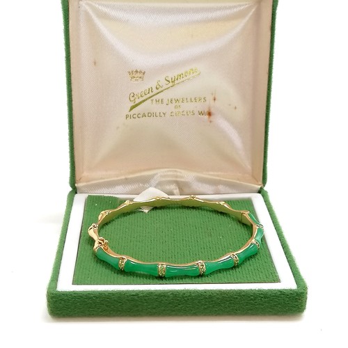 280 - 18ct marked gold & jade and green stone bangle in a bamboo style - 16.8g total weight