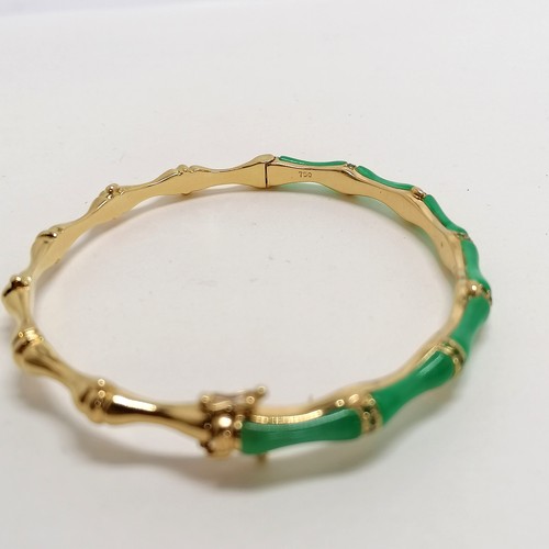280 - 18ct marked gold & jade and green stone bangle in a bamboo style - 16.8g total weight