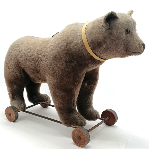 2 - Antique Steiff brown bear on metal framed wooden wheels and small black button to ear & working grow... 