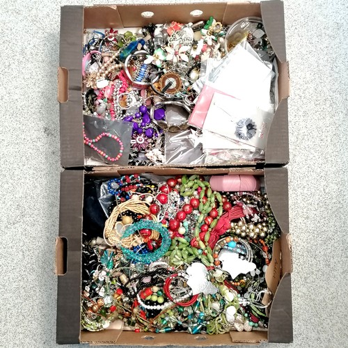 192 - 2 x boxes of costume jewellery inc Africa aluminium hand crafted earrings, Bulgarian charity necklac... 