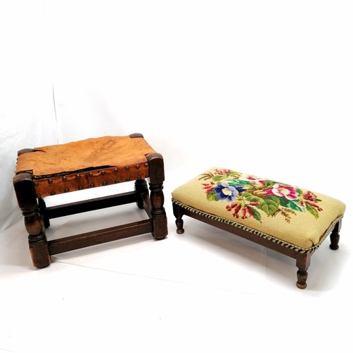 581 - 2 foot stools - 1 tapestry covered, 1 with studded leather top (a/f) - 26cm x 38cm x 26cm high