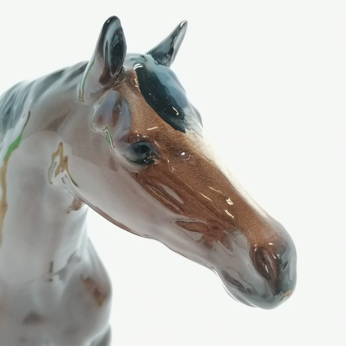 12 - Beswick horse with attached tail - 28cm high with no obvious damage