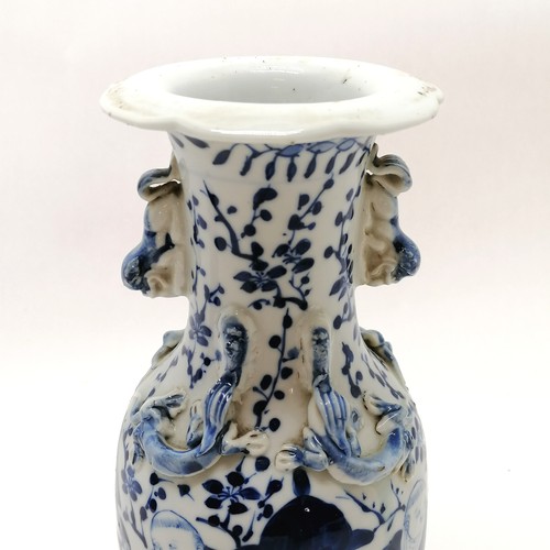 49 - Antique Chinese blue & white vase decorated with applied dragon & fo dogs & has 4 character mark to ... 