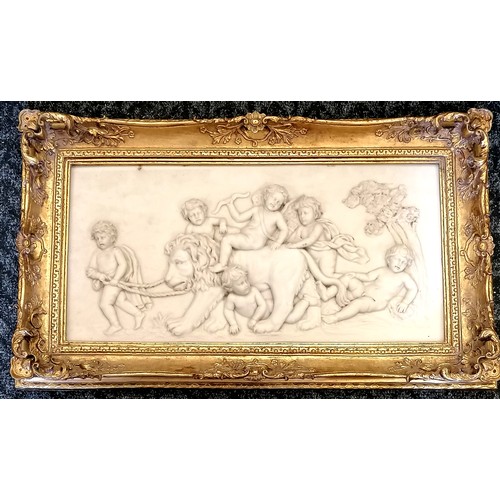 87 - Gilt framed large relief moulded panel depicting eros & putti with a lion - 64cm x 44cm ~ slight a/f... 