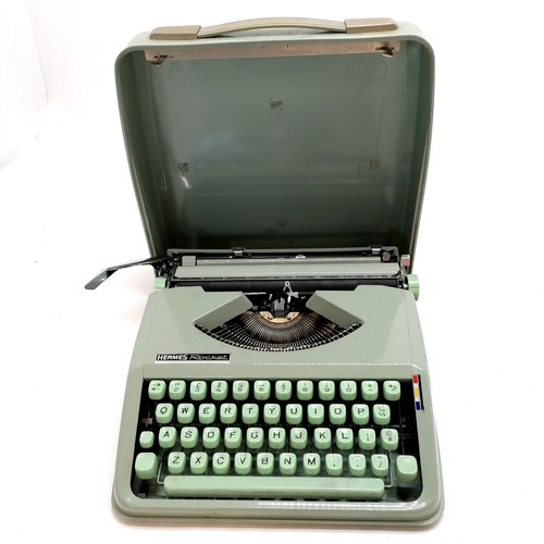 100 - Hermes Rocket green typewriter in original carry case - 30cm x 32cm.In good working condition but ne... 