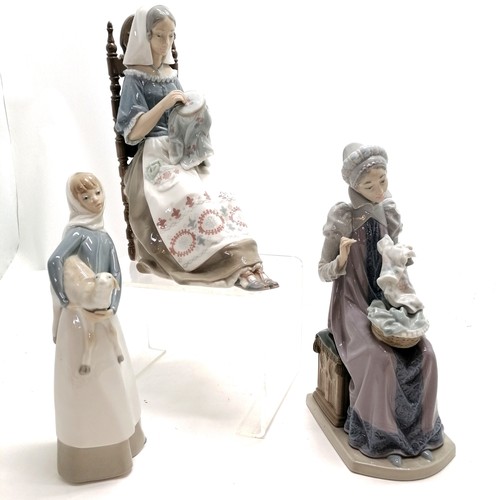 147 - 3 x Lladro figurines - 2 ladies sewing (tallest 30cm high & 22cm deep) + a lady with a sheep ~ no ob... 