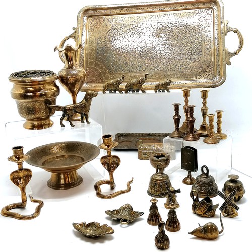 153 - Qty of brassware inc pair of Indian cobra candlesticks (15cm high), qty of bells, Indian tray etc