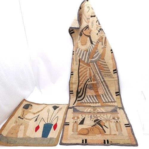 189 - Two Egyptian wall hangings depicting Pharoah etc.. Largest 130cm x 46cm