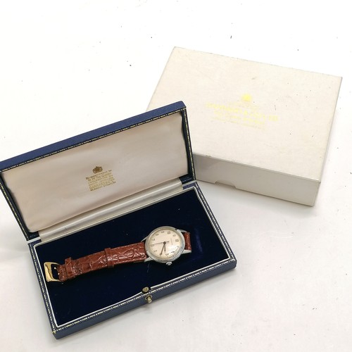 224 - Garrard & Co Ltd stainless steel gents manual wind wristwatch (32mm case) in original fitted box (+ ... 