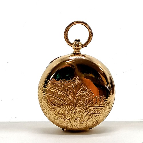 239 - 18ct gold outer cased pocket watch (38mm) and has metal inner dust cover ~ total weight 50g with an ... 