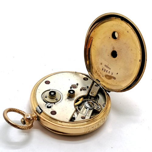 239 - 18ct gold outer cased pocket watch (38mm) and has metal inner dust cover ~ total weight 50g with an ... 