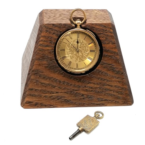 239 - 18ct gold outer cased pocket watch (38mm) and has metal inner dust cover ~ total weight 50g with an ... 