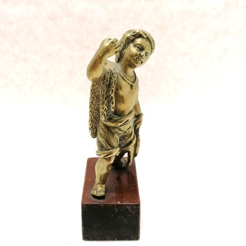 16 - Antique ormolu bronze figure of a fisher boy on a wooden base - 11cm high & lacks detail to shoulder